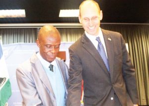 US Embassy Chargé d’Affaires Carl Fox (right) and Minister of Public Works and Transport Lebesa Maloi cut the Independence Day cake on Thursday at the American Embassy in Maseru.