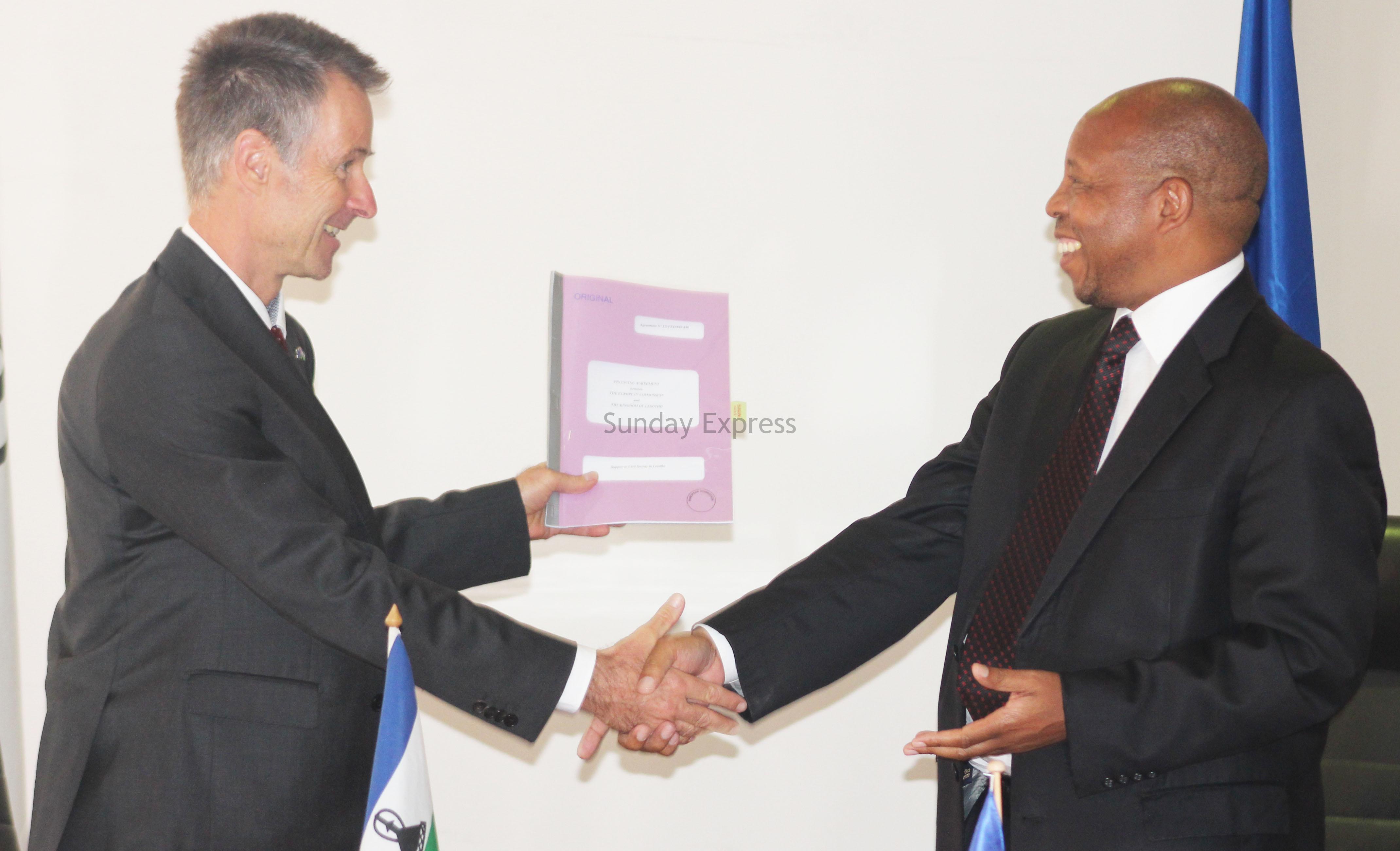 Minister of Finance Moeketsi Majoro and the EU Ambassador to Lesotho Christian Manahl (left) (6)