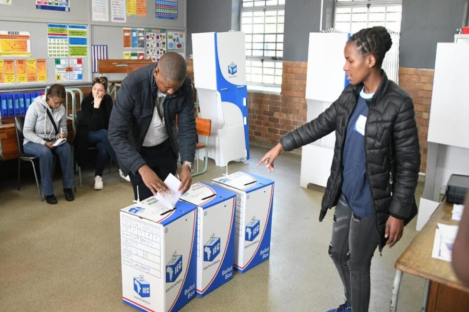 A voter casts a ballot in South Africa